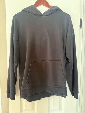 Women's TNA faded black oversized hoodie. Size L